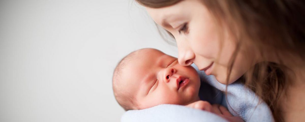 newborn-baby-woman-holding-1-1200x480.jpeg